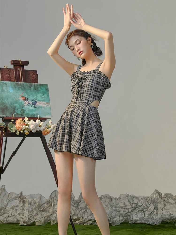 Женский слитный купальник в клетку - Фотография_5
